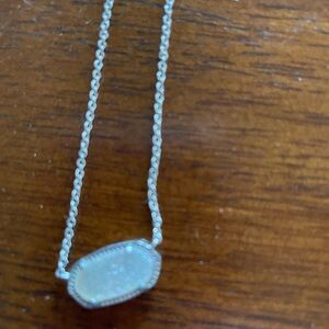 EUC Kendra Scott necklace. Silver setting/chain. Silver/whitish druzy stone.